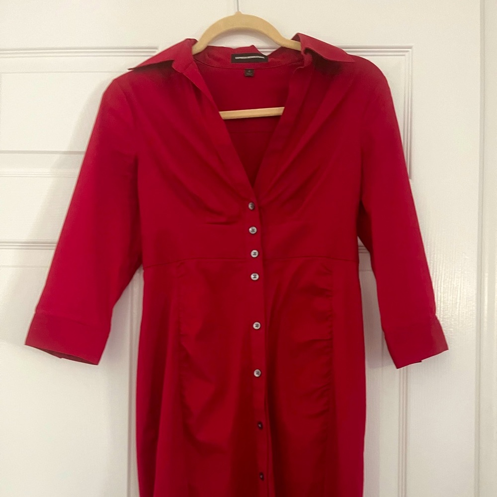 Perfect work dress. Has hoops for belt. More of a burgundy color than red.